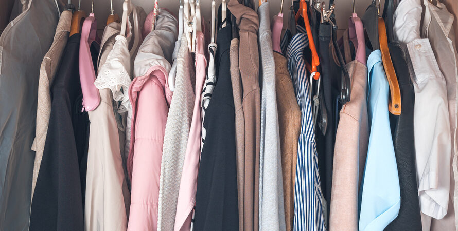 Women's,clothing,hangs,on,hangers,in,the,closet.,wardrobe,with