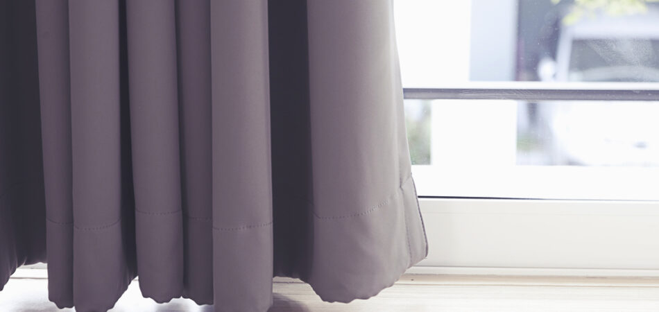 Close,up,of,curtain.,part,of,draperies,at,a,window.