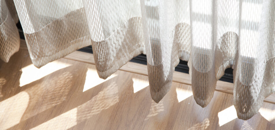 Light,shine,through,the,curtain.,close,up,of,draperies,at