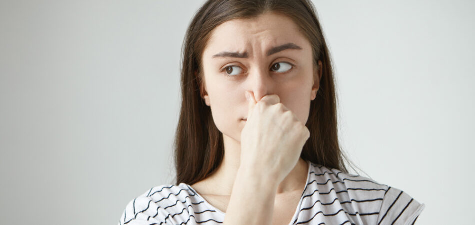 Horizontal,isolated,studio,shot,of,frustrated,frowning,young,dark,haired