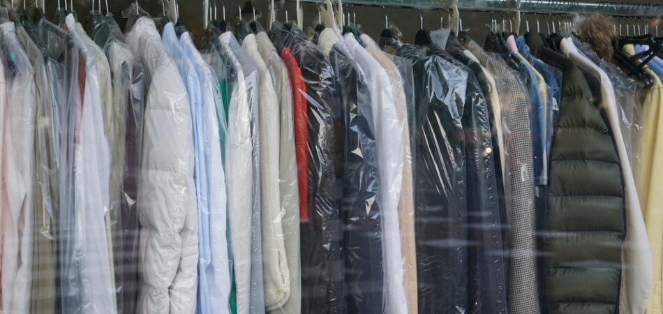 Clothes,after,dry,cleaning,in,the,laundry.,hangers,with,clean